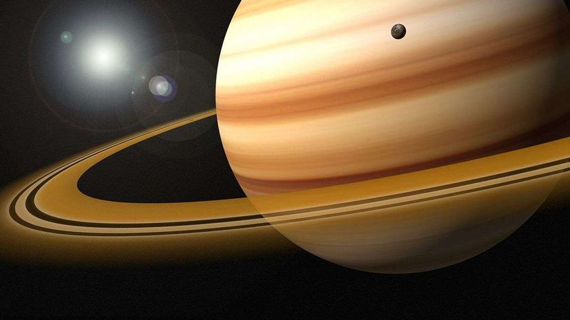 New Theory: Ancient Dwarf Planet Collisions May Have Formed Saturn’s Rings