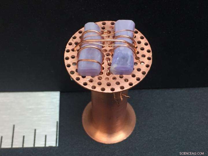 Crystal Anomalies Reveal Rare Quantum Spin Liquid State