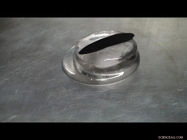 Ice Disk Levitates and Glides on Hot Surfaces: A Modern Leidenfrost Effect