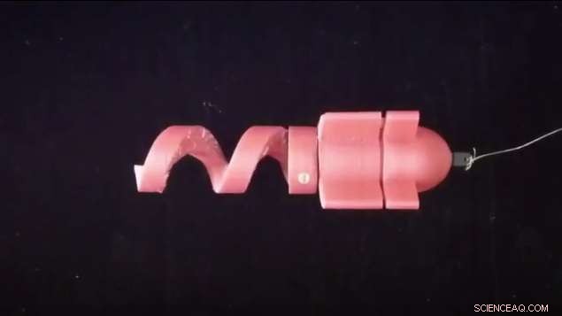 Innovative Helical Locomotion of a Sand Robot Through Granular Media