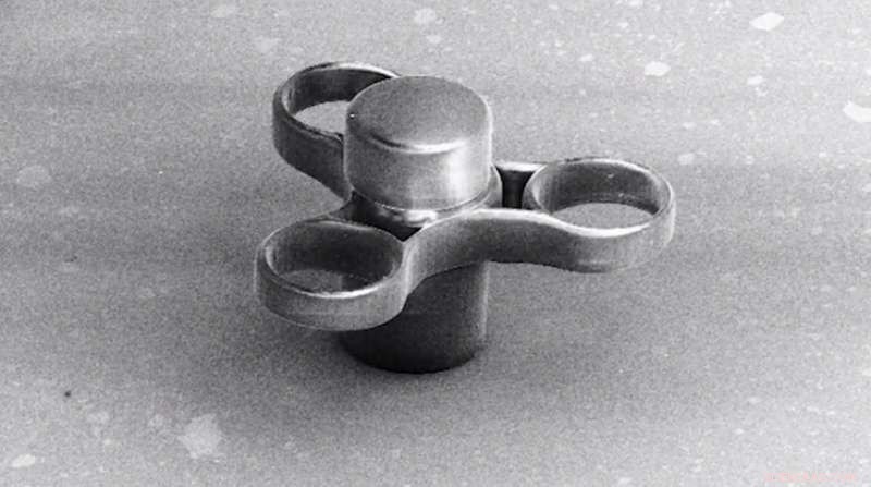 World s Smallest Fidget Spinner Created with Laser 3‑D Printing and a Drop of Liquid