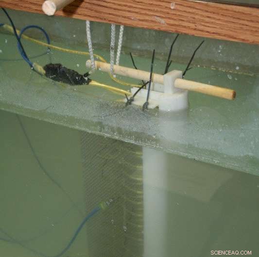 Electromagnetic Water Cloak Cuts Drag & Eliminates Wake: A Breakthrough