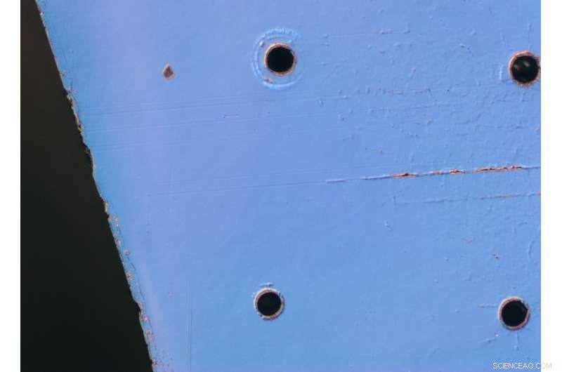 Laser‑Induced Nanocraters in Glass: A New Path to Miniaturized Telecommunication Components