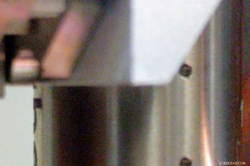 Student Achieves Photon-Mediated Interaction Between Two Qubits