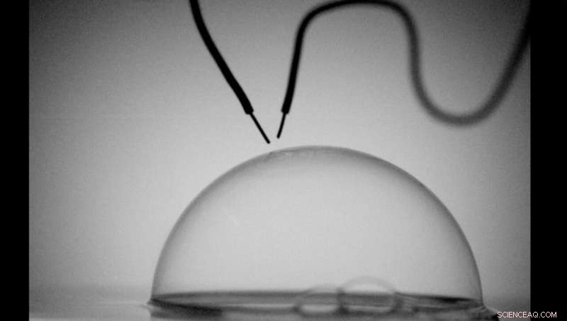 The Physics Behind Giant Bubble Bursts: Unlocking Fluid Mechanics