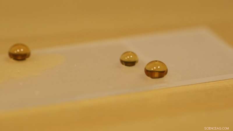 Specialized Tube Coatings Make Viscous Liquids Flow Faster Than Less Viscous Ones