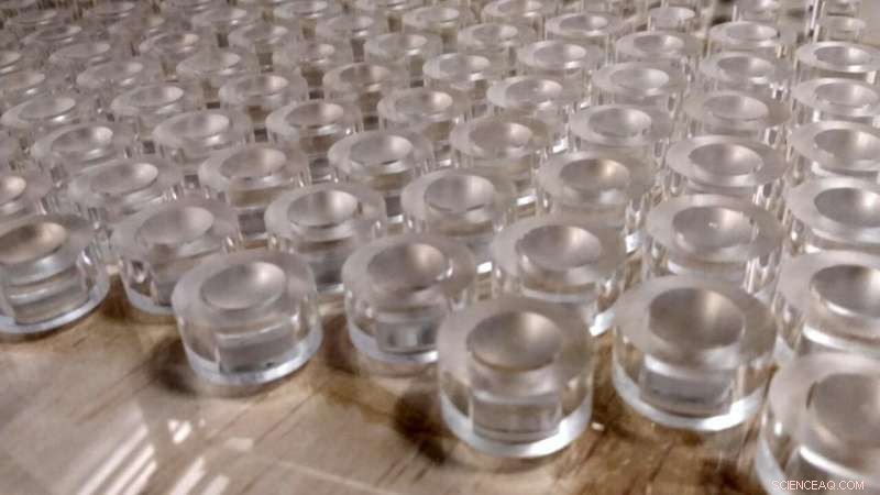 Achieving Perfect Sound Transmission Through Barriers with Phononic Crystals