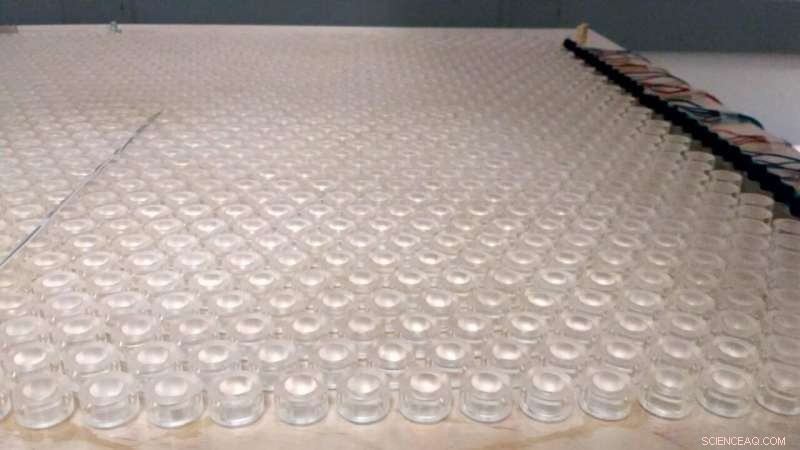 Achieving Perfect Sound Transmission Through Barriers with Phononic Crystals