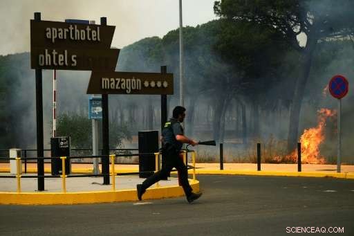 Spanish Firefighters Contain Wildfire Threatening Renowned National Park