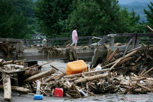 30 Lives Lost in Japan s Southern Floods as Death Toll Rises