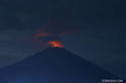 Mass Exodus Amid Mount Agung Eruption: Some Evacuate, Others Stay or Seek the Volcano