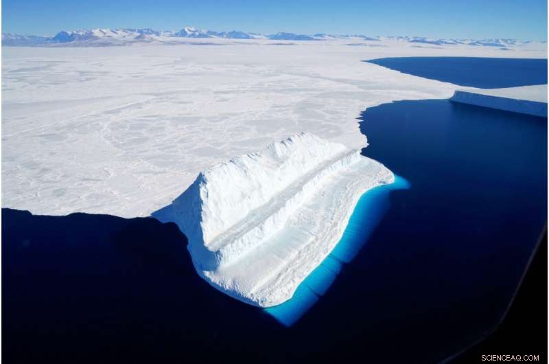 NASA Captures Stunning Blue Iceberg in McMurdo Sound, Antarctica