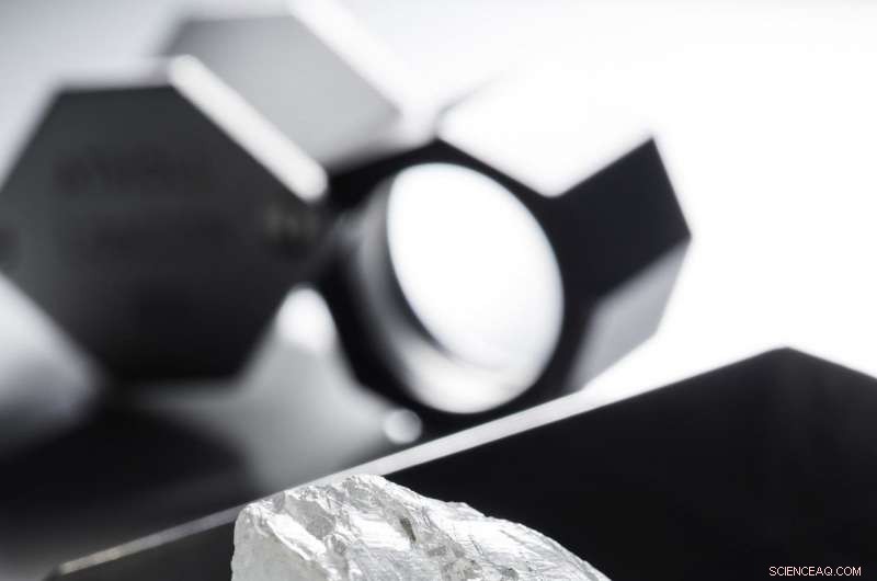 Super-Deep Diamond Confirms First Natural Occurrence of Earth s Fourth Most Abundant Mineral