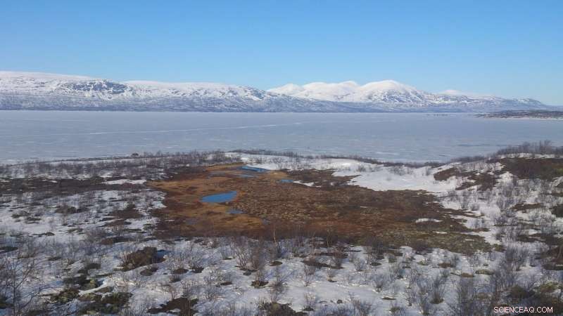 How Thawing Permafrost Microbiomes Accelerate Climate Change