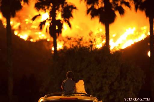 California Firefighters Battle to Protect Homes from Wildfire