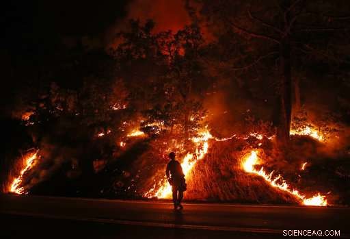 California Firefighters Battle to Protect Homes from Wildfire