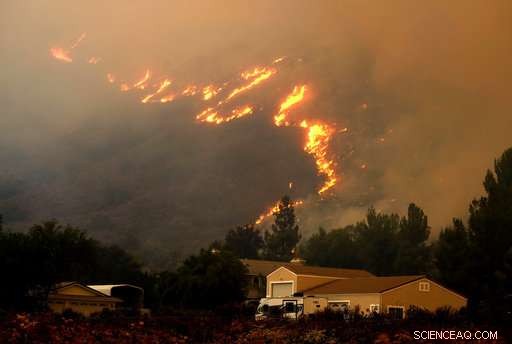 California Firefighters Battle to Protect Homes from Wildfire