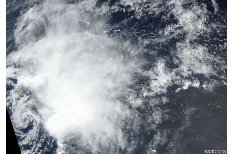 NASA s Suomi NPP Satellite Detects Wind Shear Striking Tropical Storm Nadine