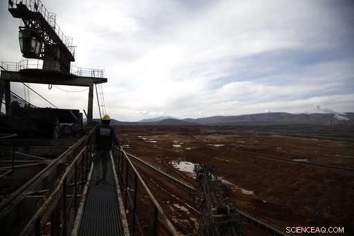 Greek Village Sinks, Exposing Nation s Coal Addiction