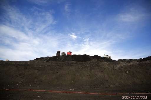 Greek Village Sinks, Exposing Nation s Coal Addiction