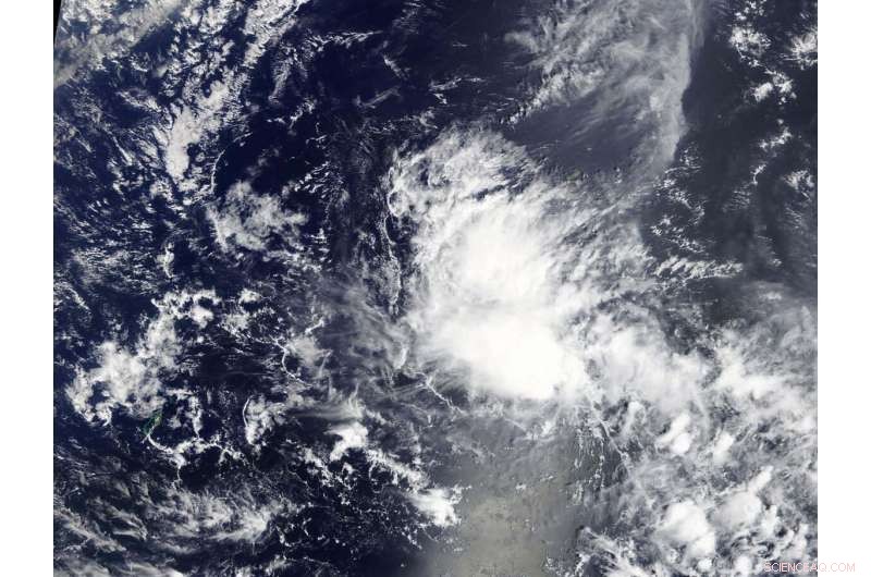 NASA Tracks Formation of Tropical Depression 03W Near Yap