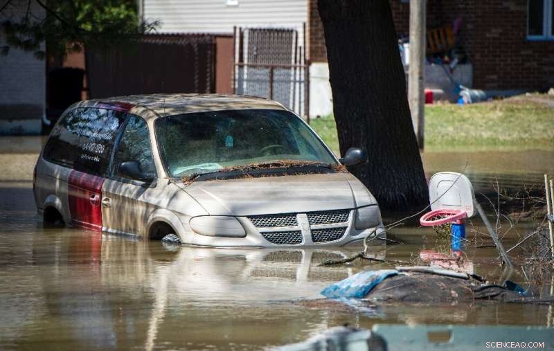 Canada Evacuates 10,000 Residents Amid Spring Floods; Rescue Teams Search for Pets