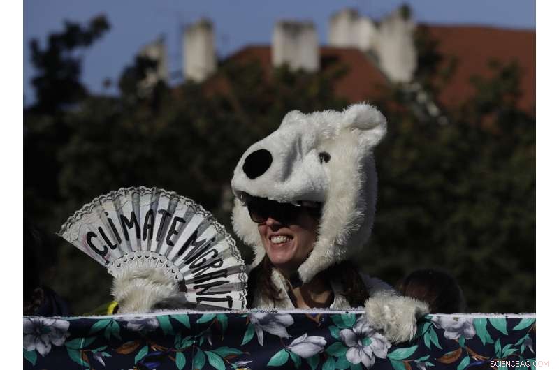 Global Climate Protesters Take to Streets from Australia to Europe, Demanding Urgent Action