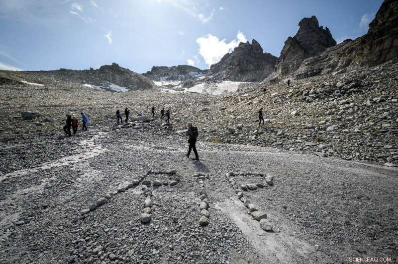 Swiss Raise Awareness with Vigil for Vanishing Glacier