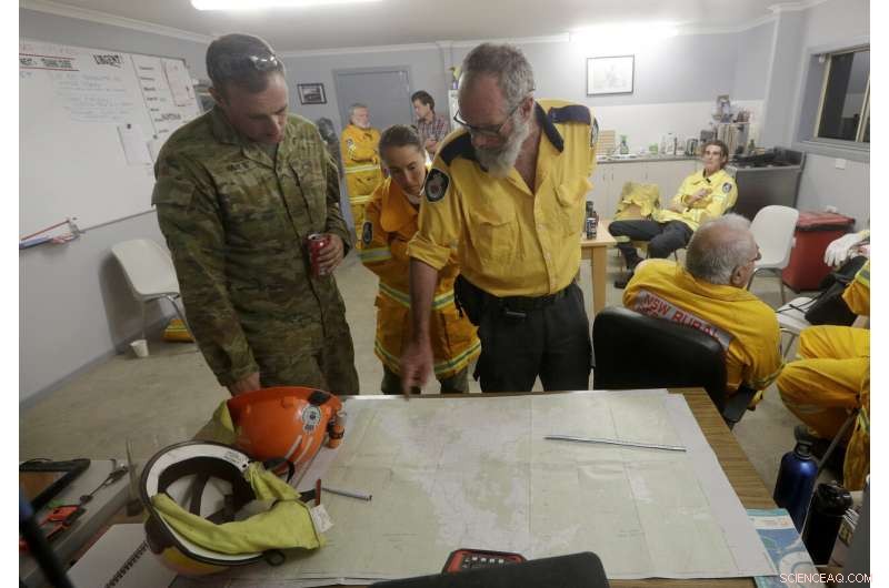 Two Australian Wildfires Merge into Massive Inferno, Injuring a Man