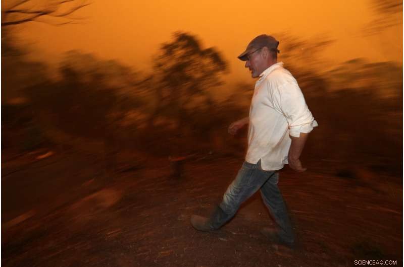 Two Australian Wildfires Merge into Massive Inferno, Injuring a Man