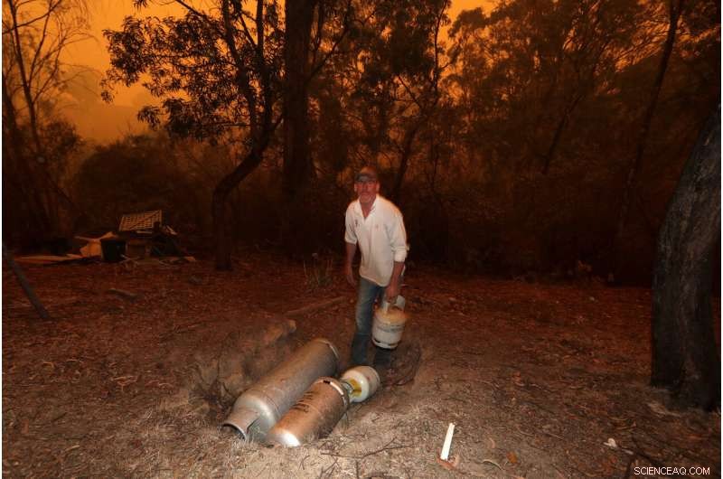 Two Australian Wildfires Merge into Massive Inferno, Injuring a Man