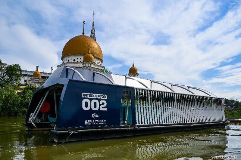 Solar-Powered Interceptor Barge Cleans Malaysia s Rivers of Plastic Waste