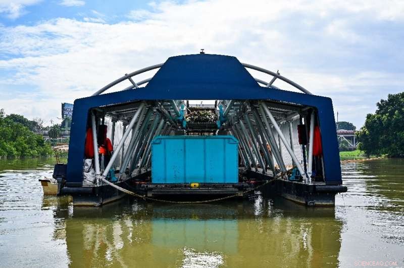 Solar-Powered Interceptor Barge Cleans Malaysia s Rivers of Plastic Waste