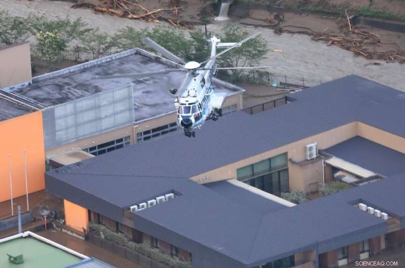 Heavy Rain Delays Rescue Efforts in Japan After Deadly Floods