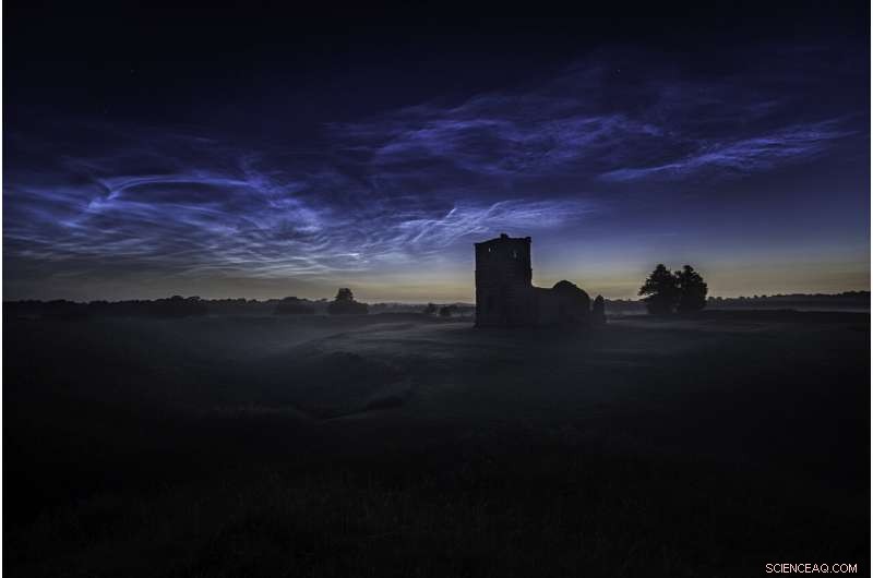 Noctilucent Clouds Captured Over Knowlton Church, Dorset – A Stunning Nighttime Phenomenon