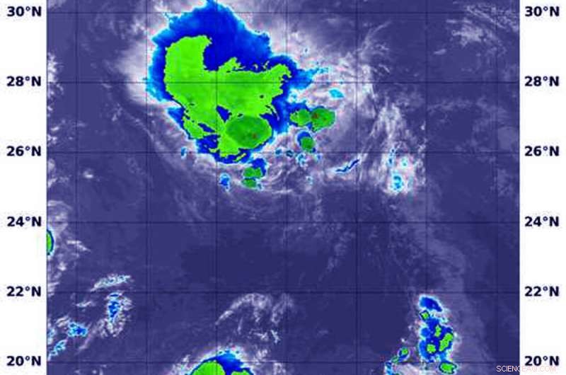 NASA Tracks Post-Tropical Low Douglas Crossing the Line
