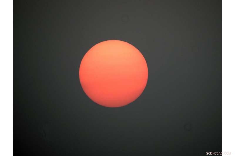 Western Wildfire Smoke Blurs East Coast Skies, Creates Vivid Sunsets