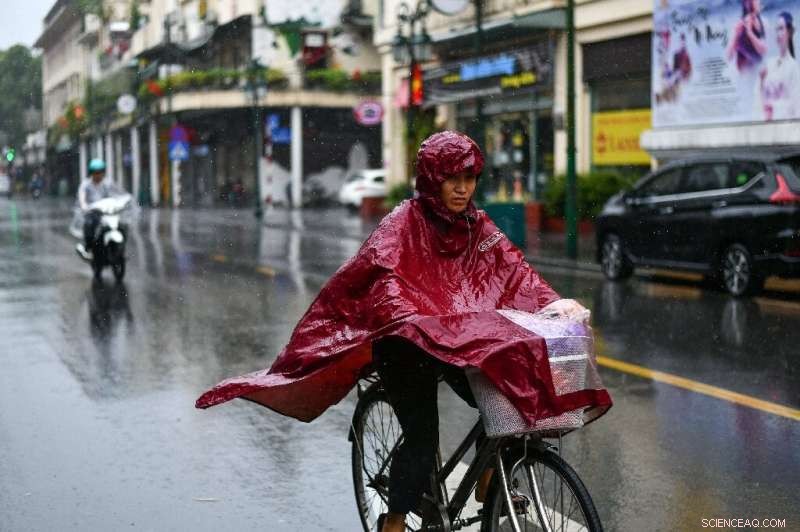 Vietnam Searches for Missing Rescue Team Amid Floods; Heavy Rain Expected