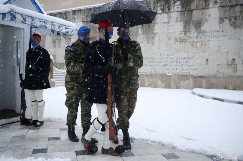 Rare Snow Covers Athens  Acropolis, Temporarily Halting Vaccinations