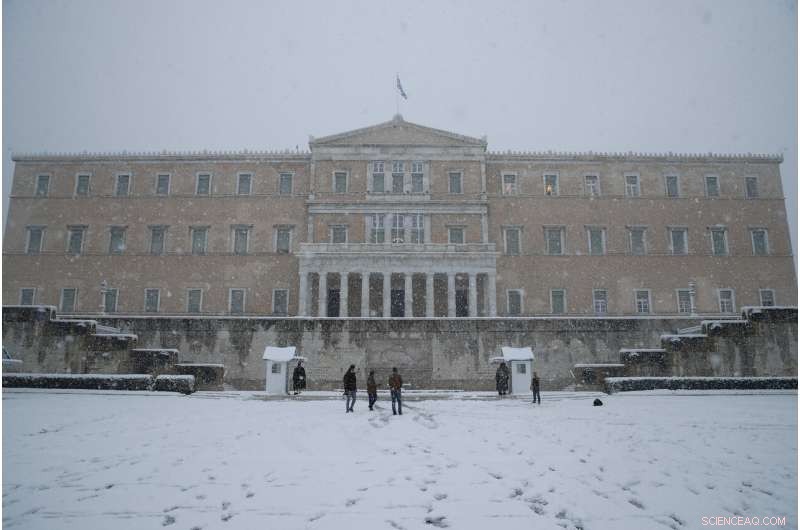 Rare Snow Covers Athens  Acropolis, Temporarily Halting Vaccinations