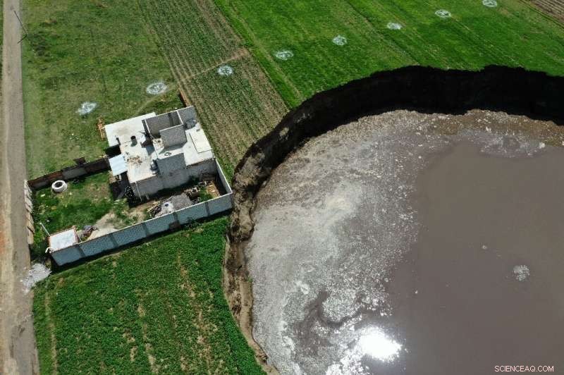 Massive Sinkhole Threatens Mexican Home in Puebla