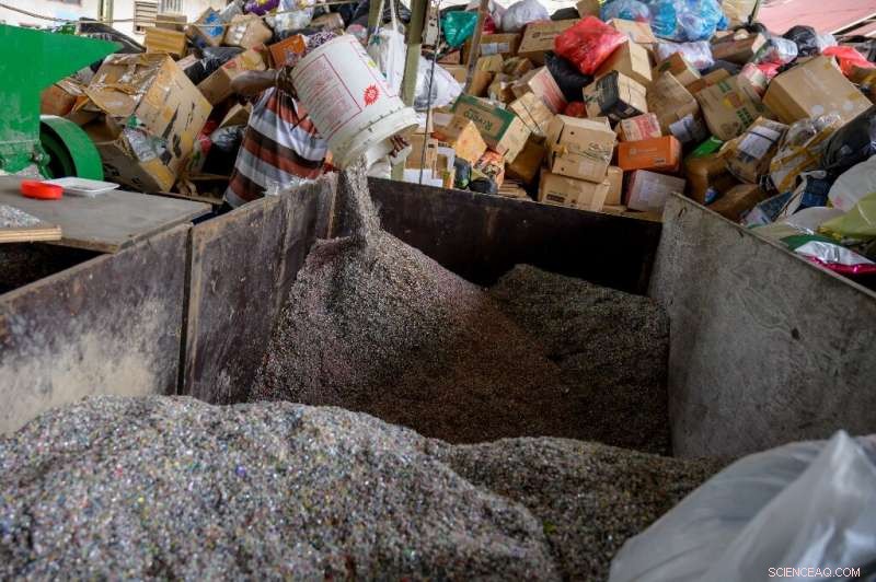 Indonesian Women Combat Plastic Waste, Turning Trash into Reusable Bricks