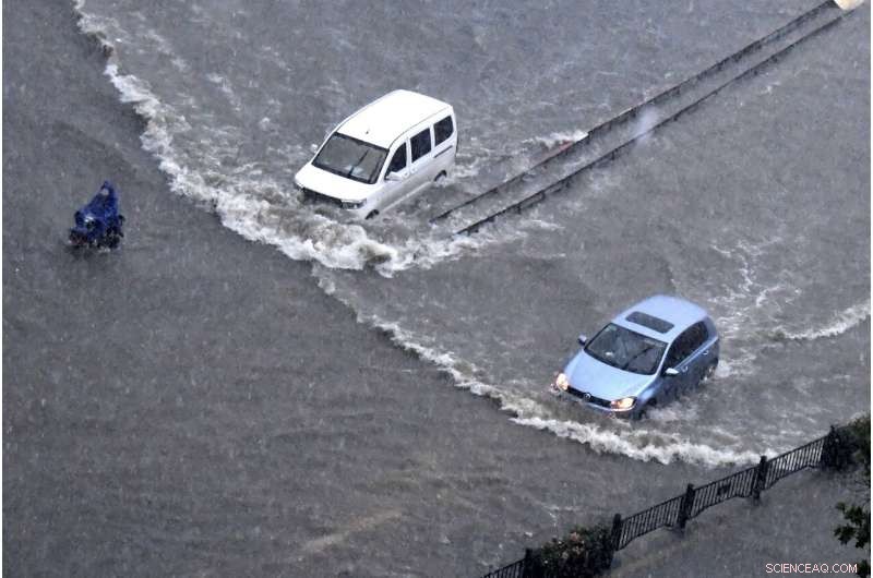 Central China Floods Claim 12 Lives as Streets Turn into Rivers