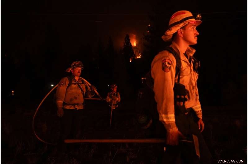 California Wildfires Threatened by Wind; Residents Return as Crews Hold Flames