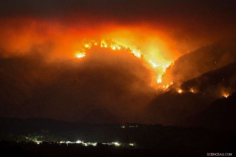 Rain Aids Efforts to Contain Spain s Massive Wildfire