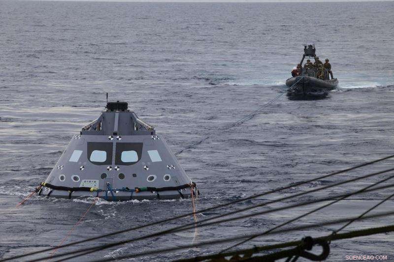 Orion Crew Module Underway Recovery Test 5: U.S. Navy Divers Secure Tether Lines