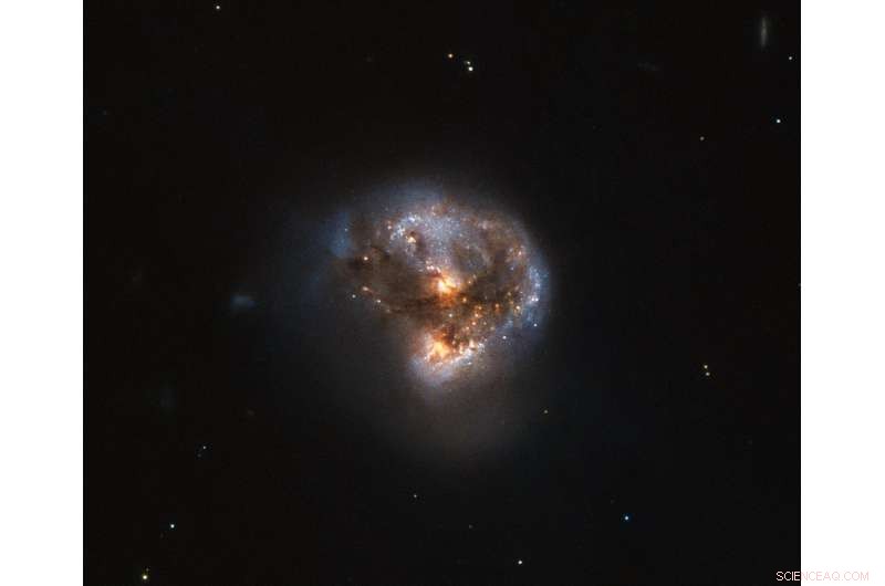 Hubble Captures Stunning View of a Cosmic Megamaser Galaxy