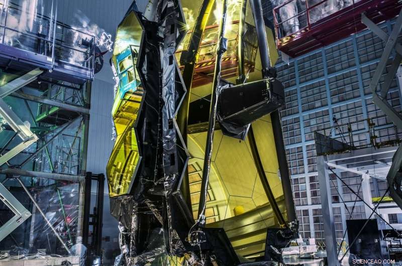 Inside NASA s Webb Telescope Clean Room: Technicians Inspect Amid Ghostly Glow