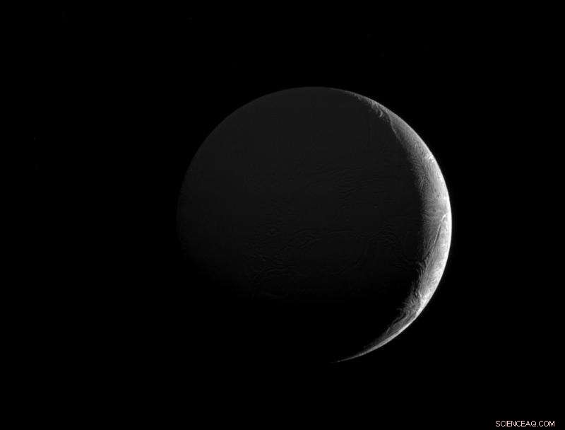 Enceladus: A Slim Crescent Reveals Icy Surface Fractures