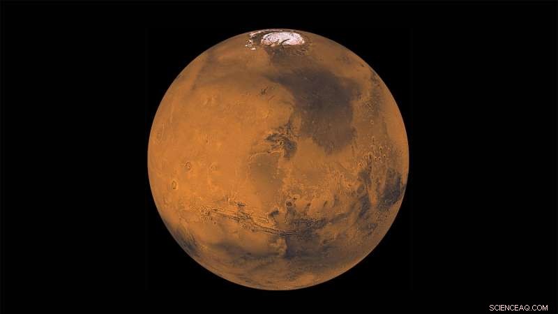 Could an Ancient Asteroid Impact Explain Mars  Geologic Paradoxes?